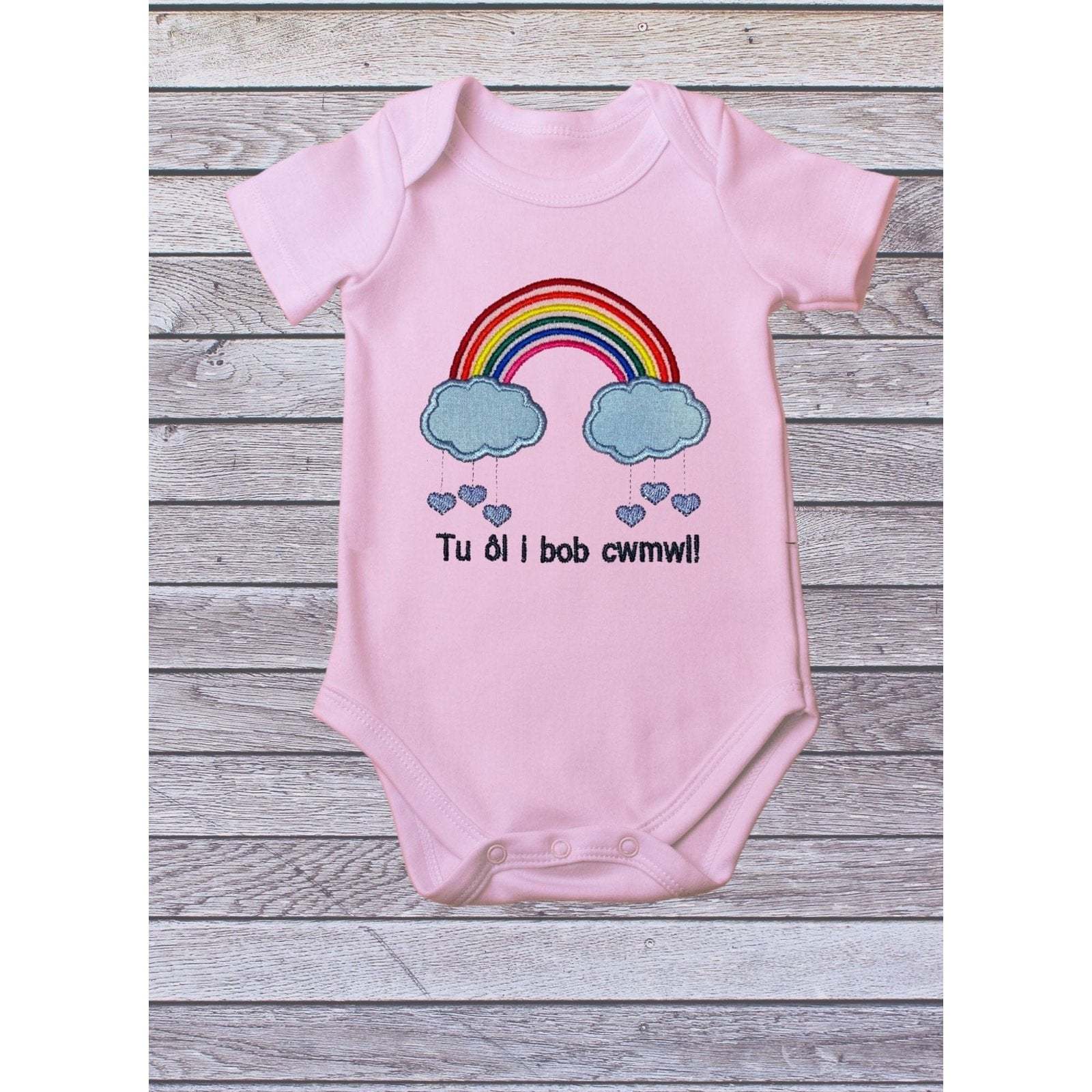 BRO-009 babygrow, welsh text, embroidered rainbow