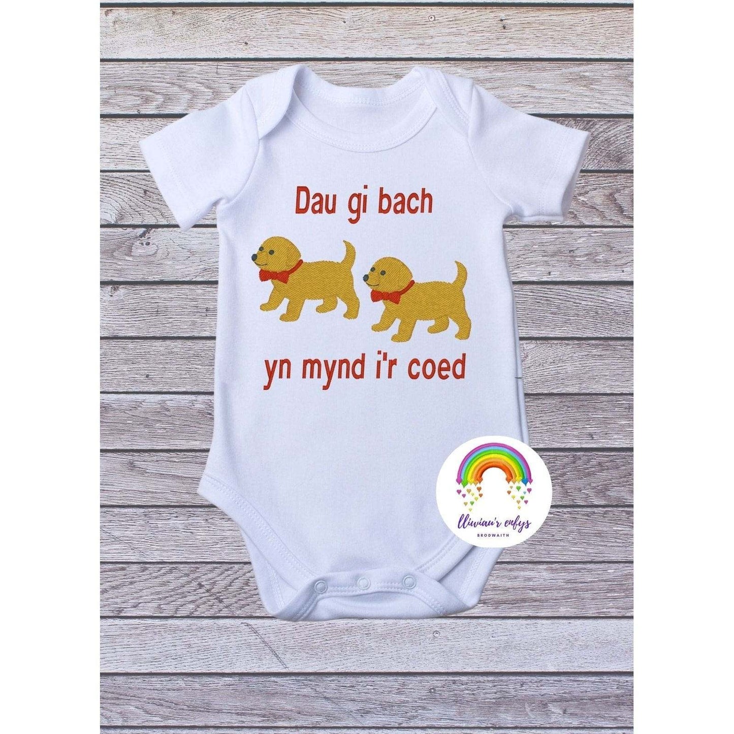 BRO-011 Babygrow Welsh phrase, babygrow, dogs,  dau gi bach yn mynd i'r coed